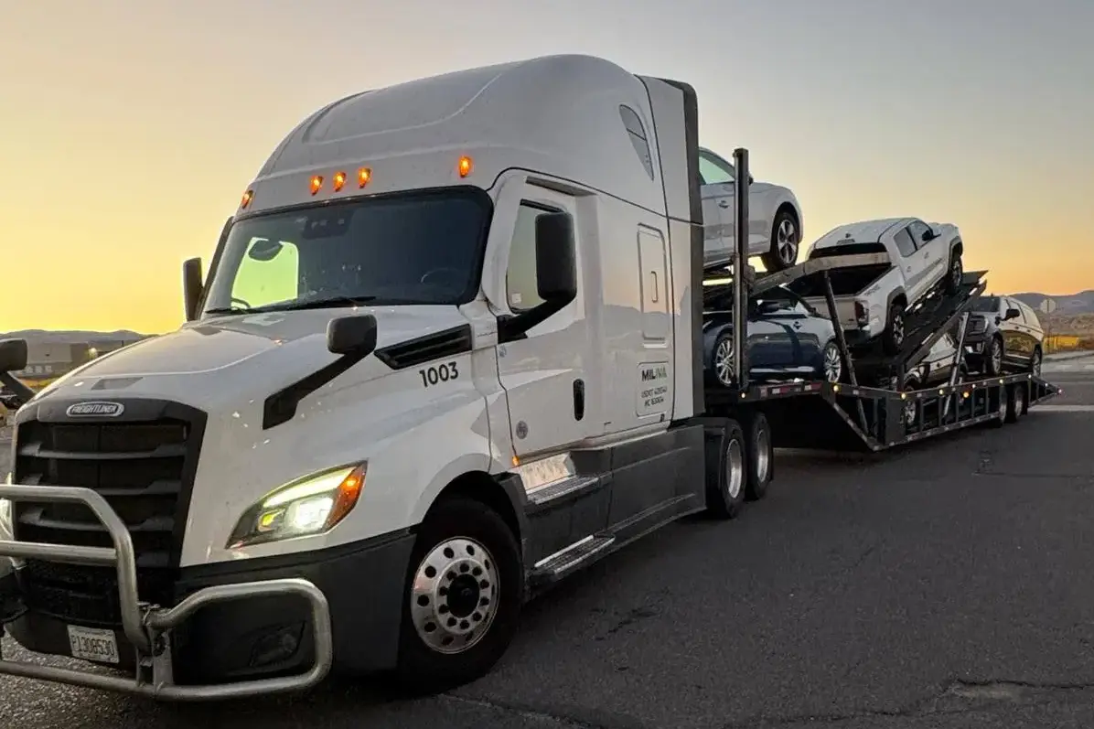 CA to MT load — Amazon Prime vans on car hauler